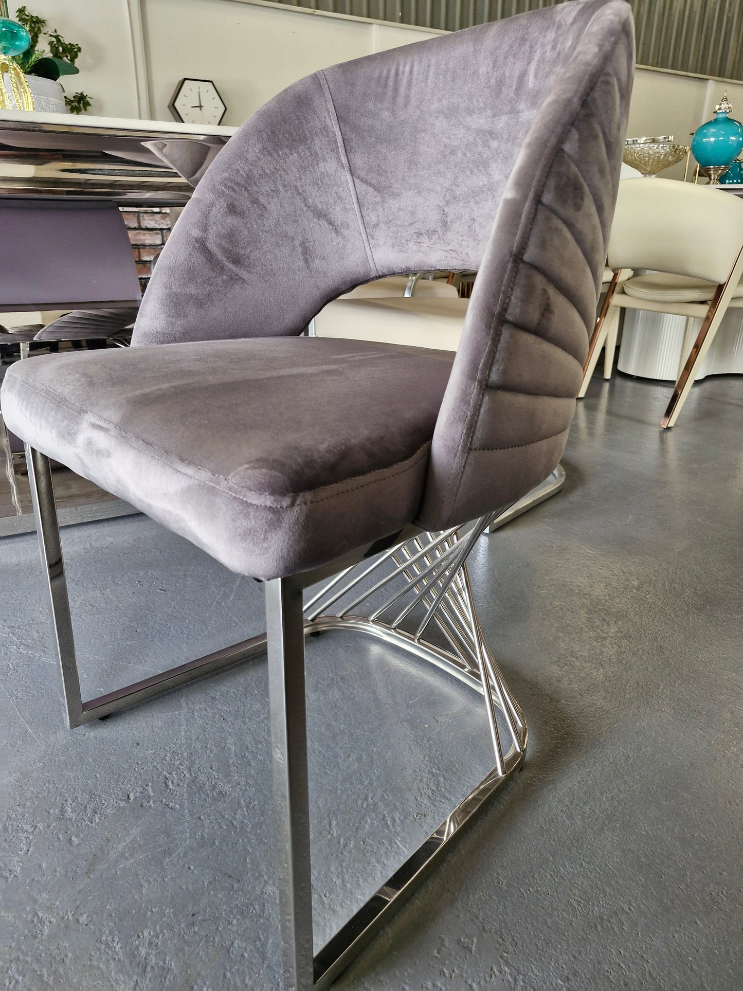 Grey velvet and silver dining chairs