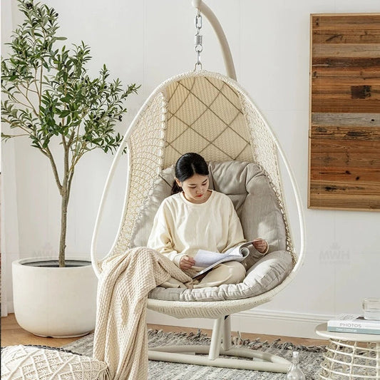 Beige outdoor swing egg chair