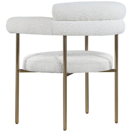 Gold and white boucle dining chairs