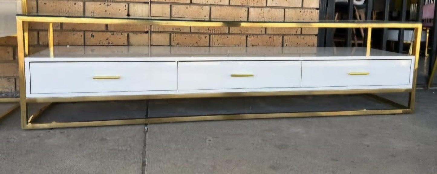 White and gold tv stand with glass top