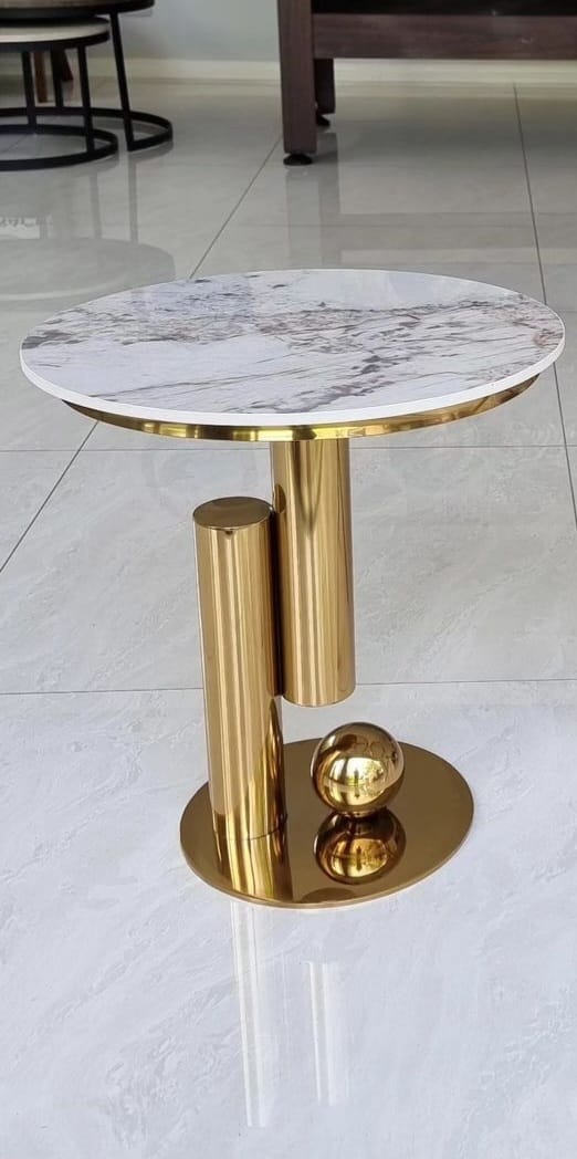 gold side table with ball
