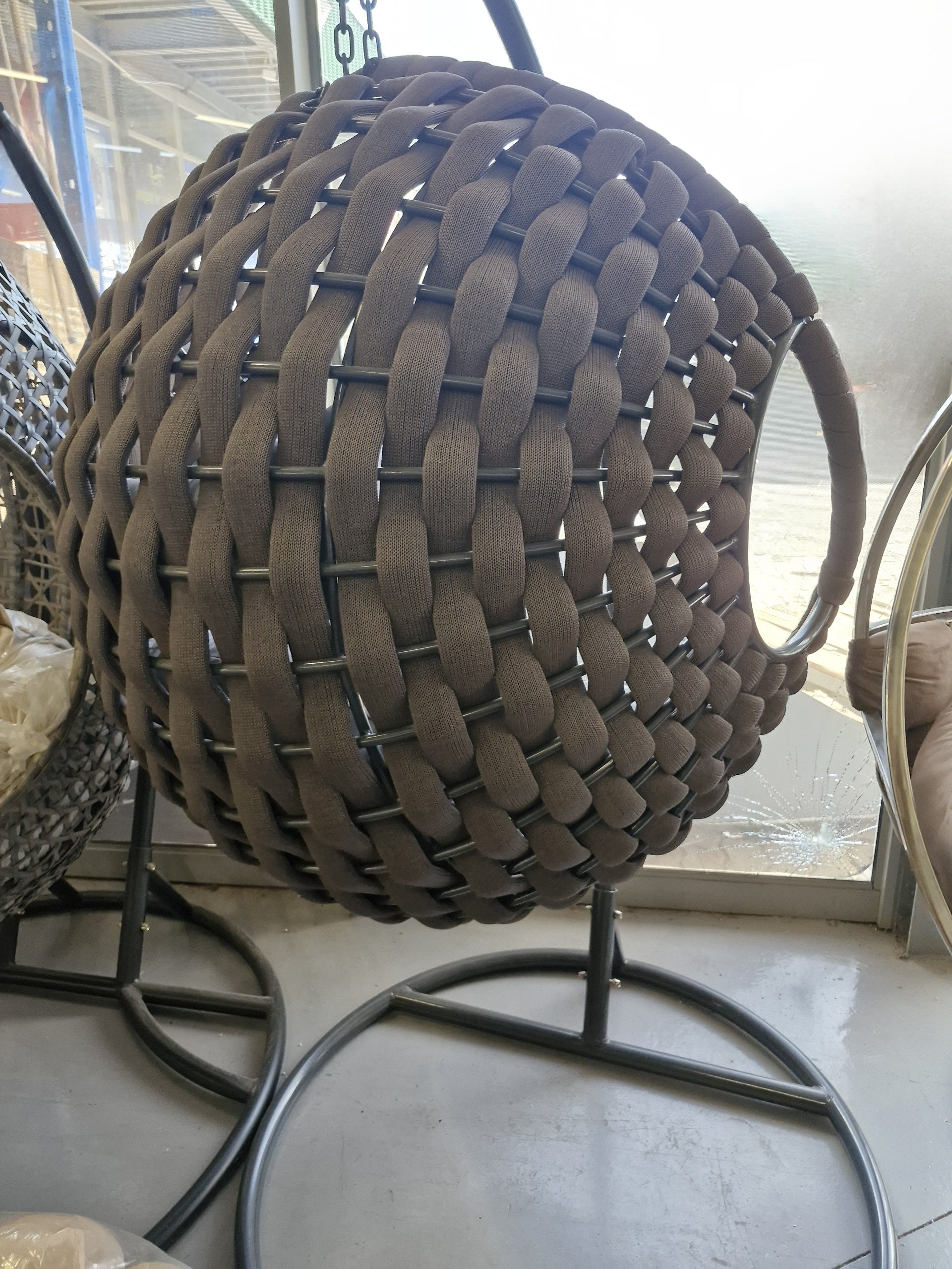 Brown outdoor round swing 