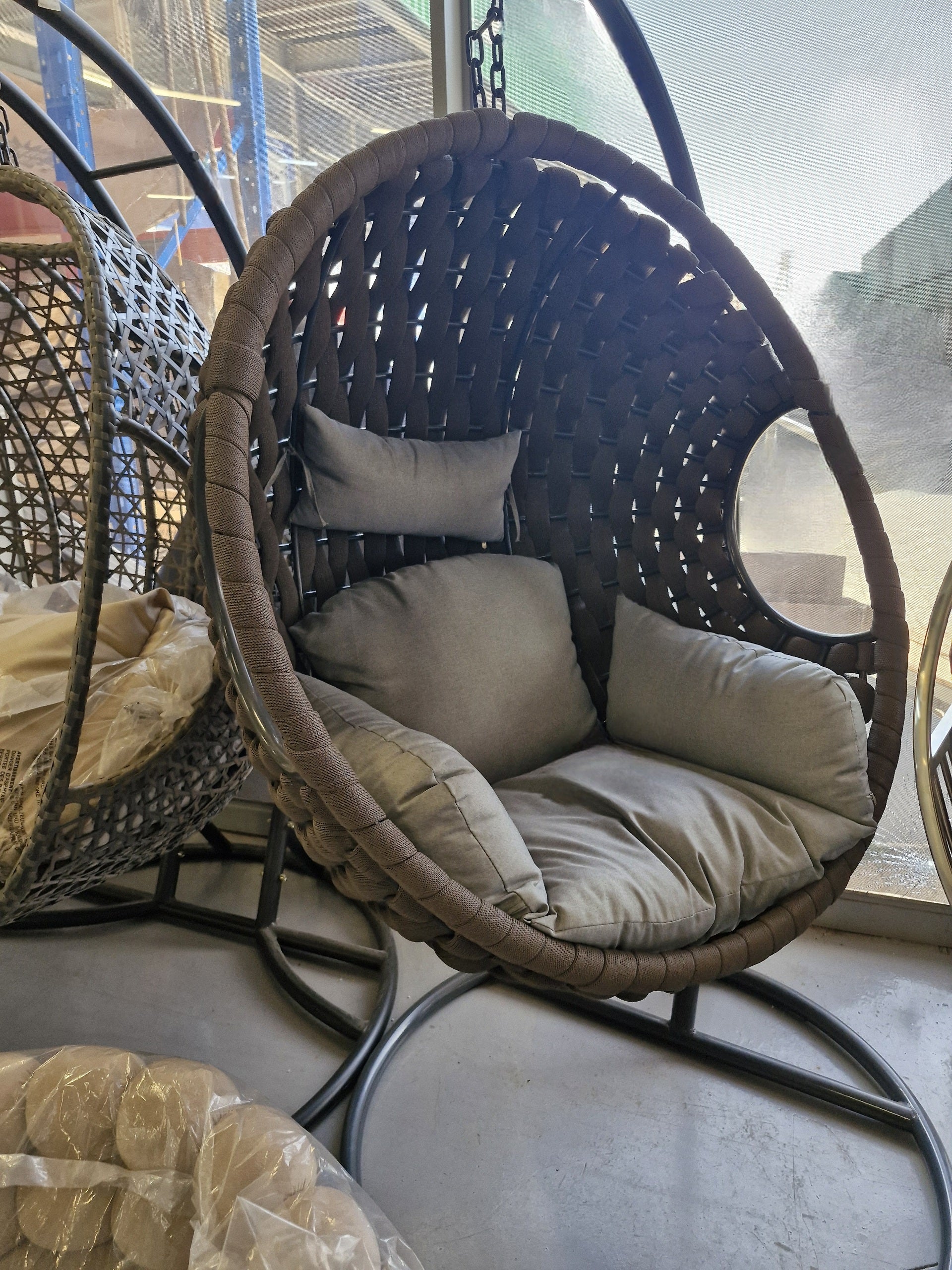 Brown outdoor round swing 