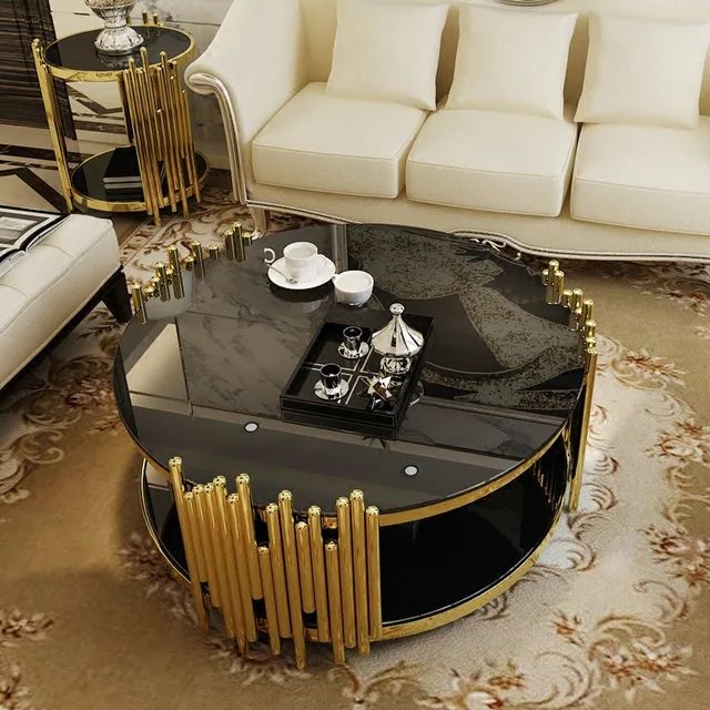 round black and gold glass coffee table